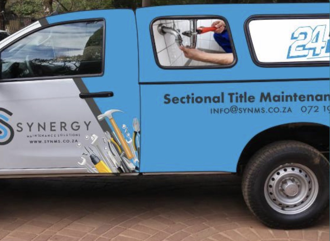 Synergy service bakkie, side view with 24-hour service branding
